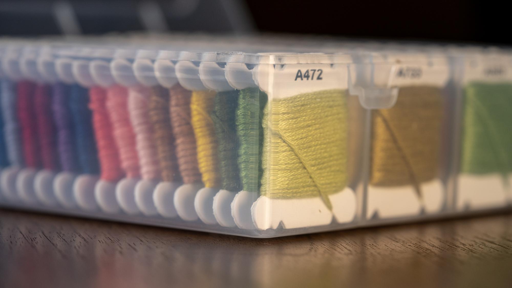 flatlay of embroidered swatches and price sheet